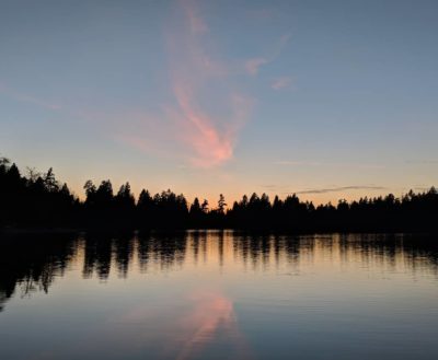 Gentle pink clouds reflected