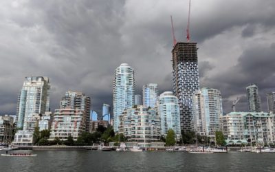 Towers under heavy grey clouds