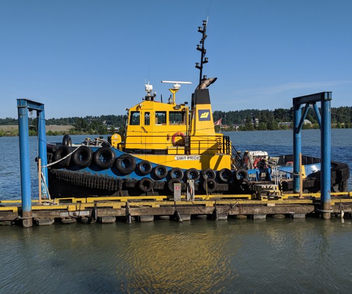 yellow tugboat