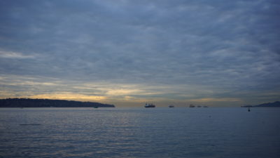 Blue clouds on blue water