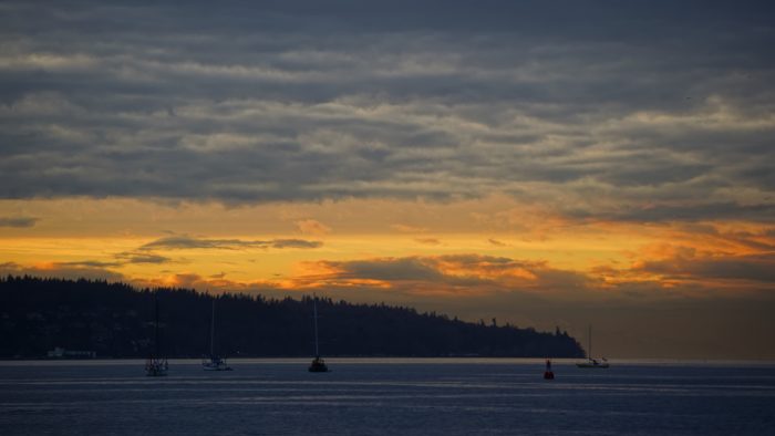 Boats and orange sky