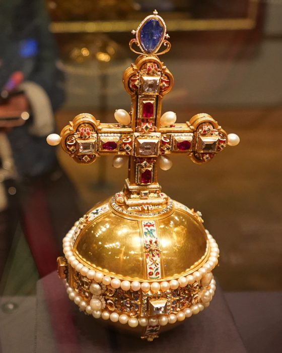 An Imperial Orb, a golden globe with a cross on top, covered in gemstones