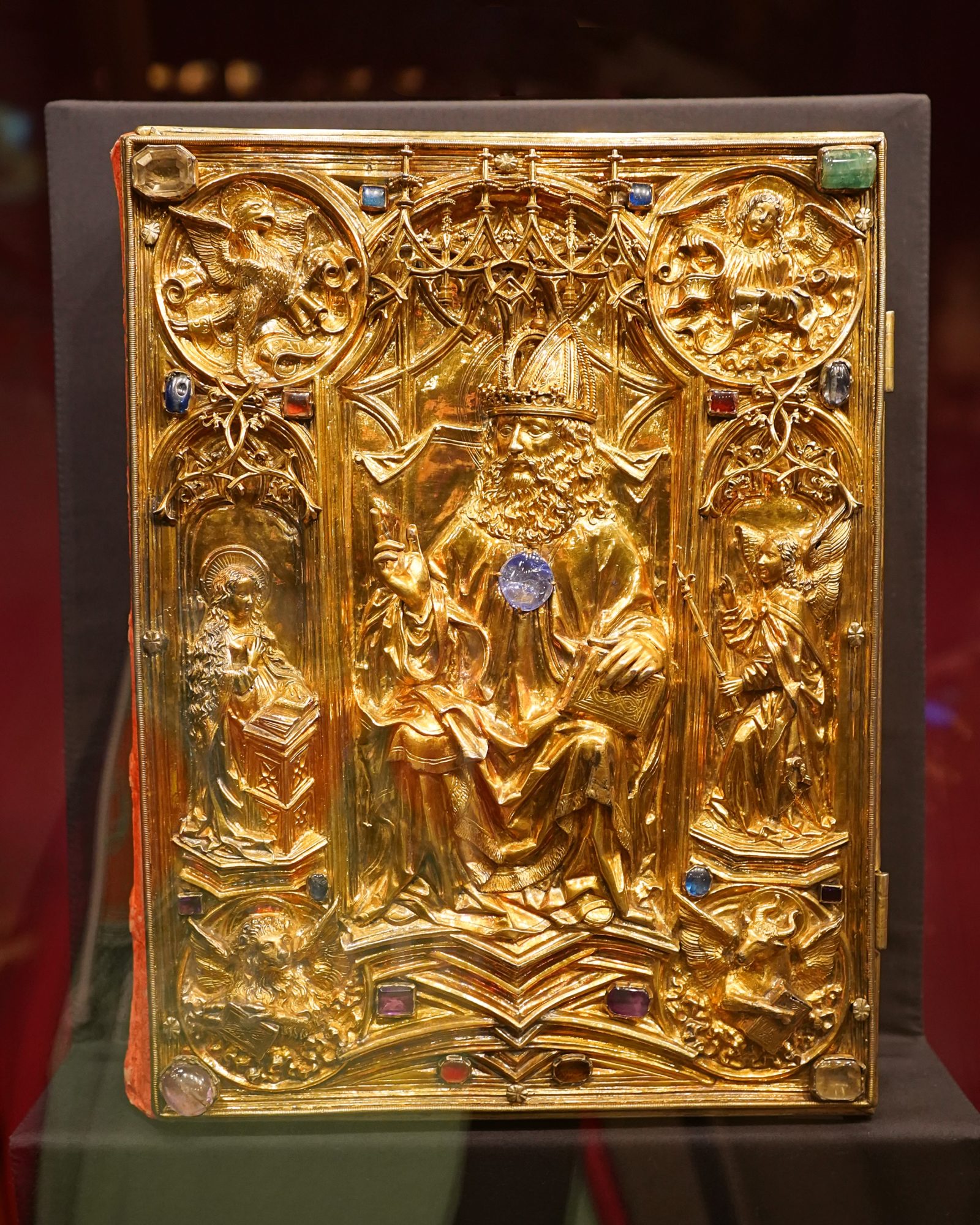 Gold-plated and sculpted cover of a book