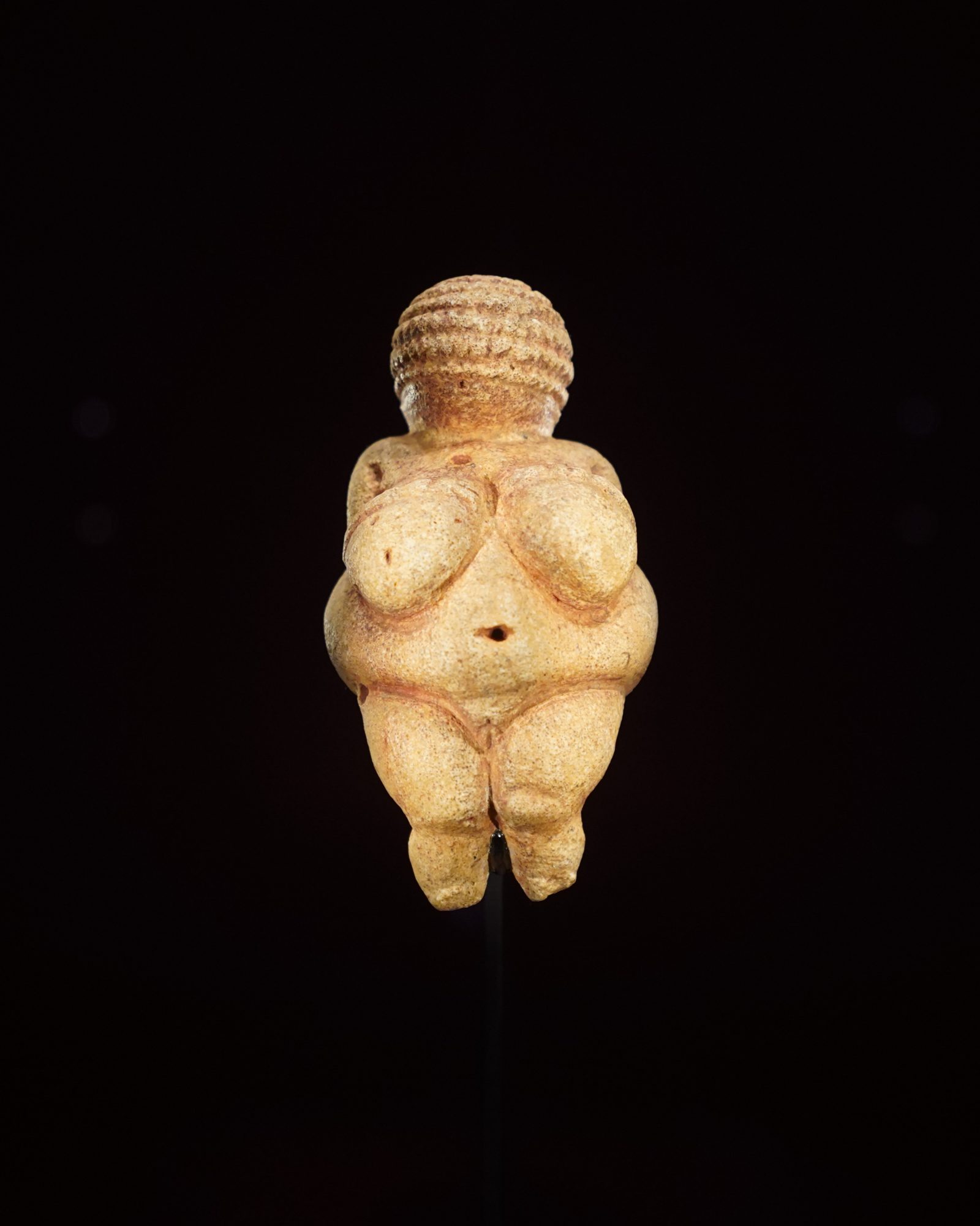 The Venus of Willendorf, a small statuette of a naked full-bodied woman