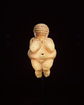 The Venus of Willendorf, a small statuette of a naked full-bodied woman