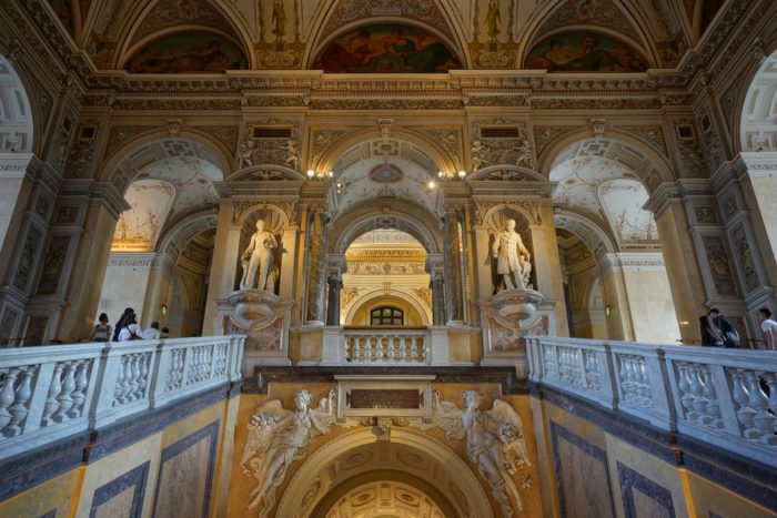 Museum main staircase: richly decorated, with two statues in the middle