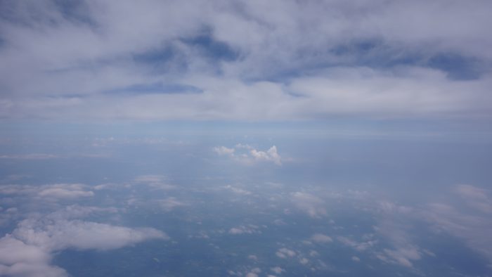 View from a plane, flying between two cloud layers