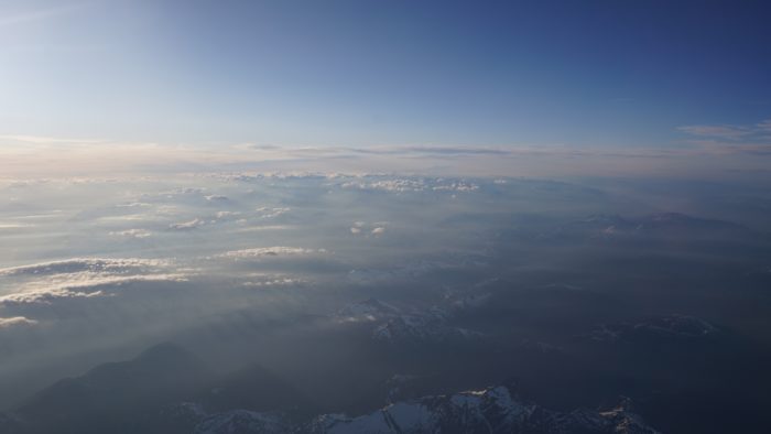 Mountains and wispy clouds